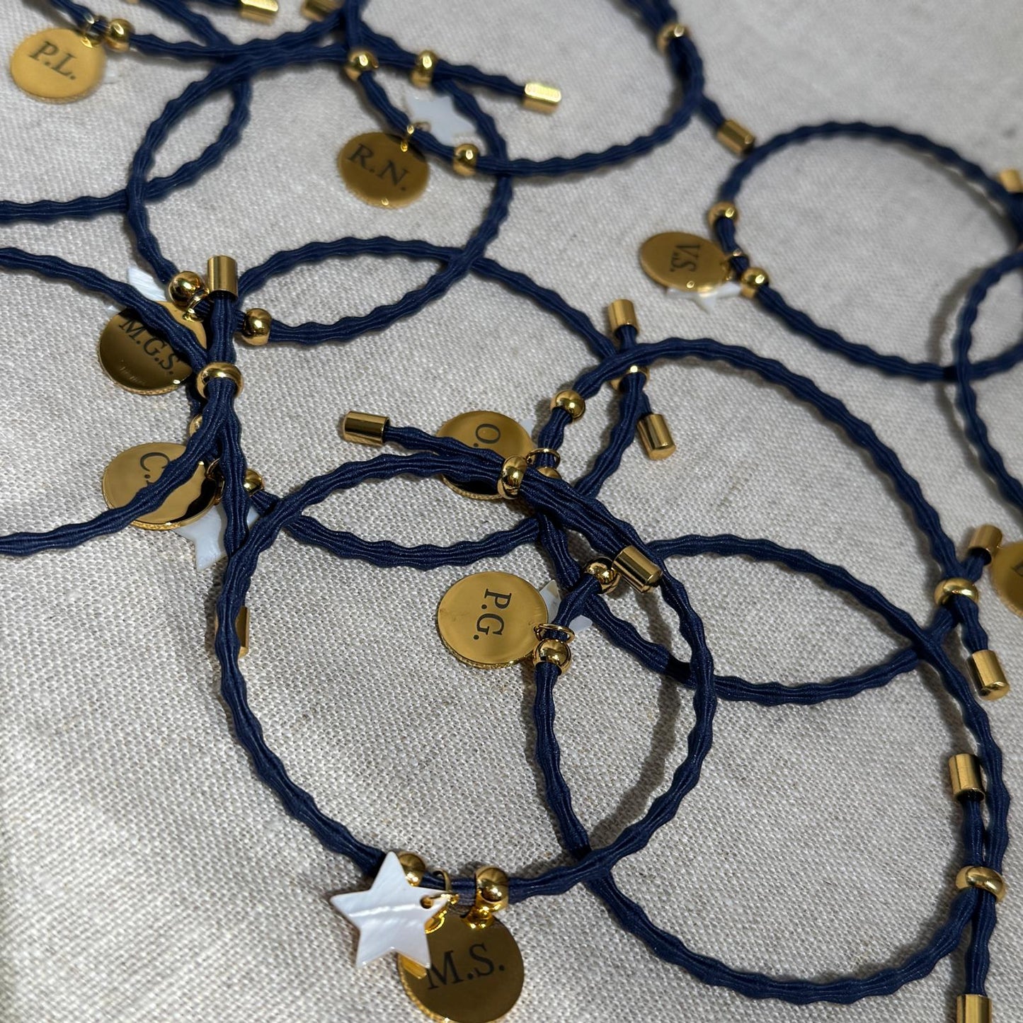 PULSERA INI